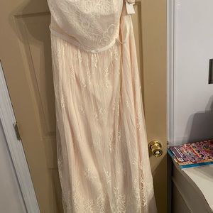 Lace overlay David’s Bridal wedding dress. This dress is floor length on me.
